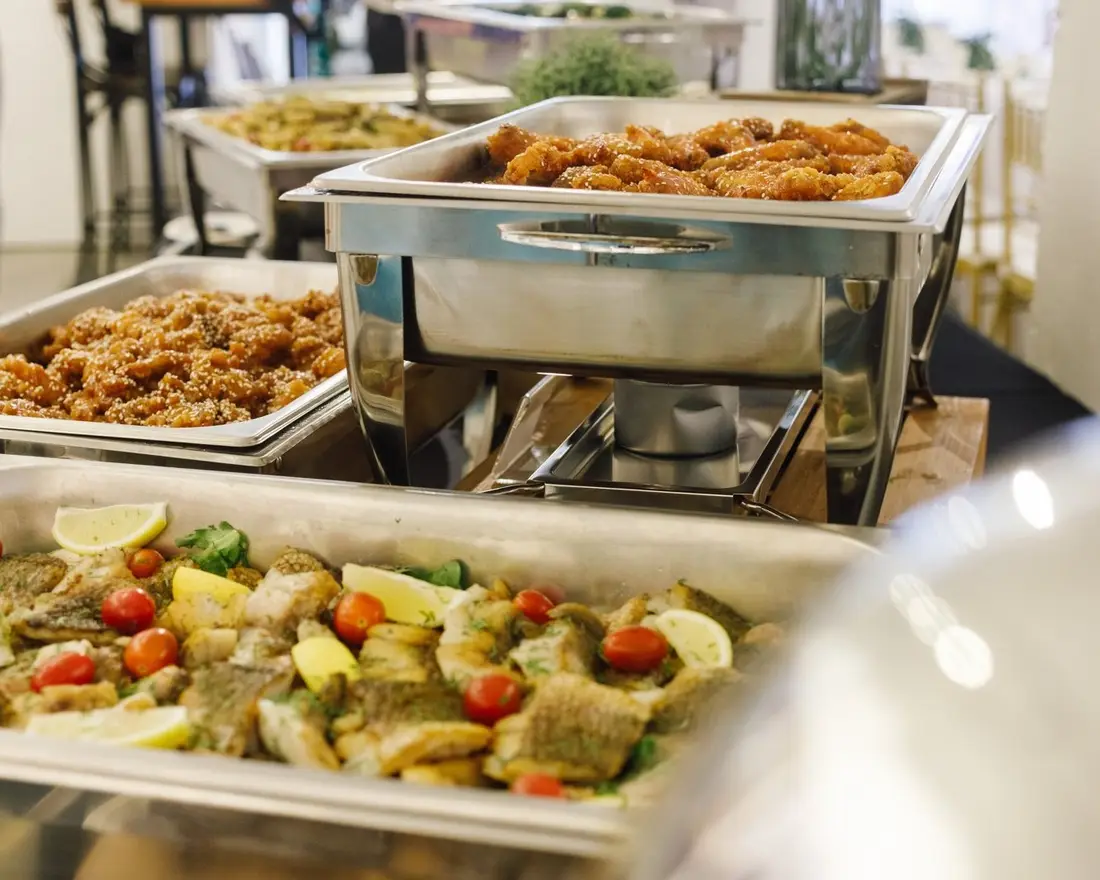 Buffet catering setup with chafing warmers for 30 people in Singapore