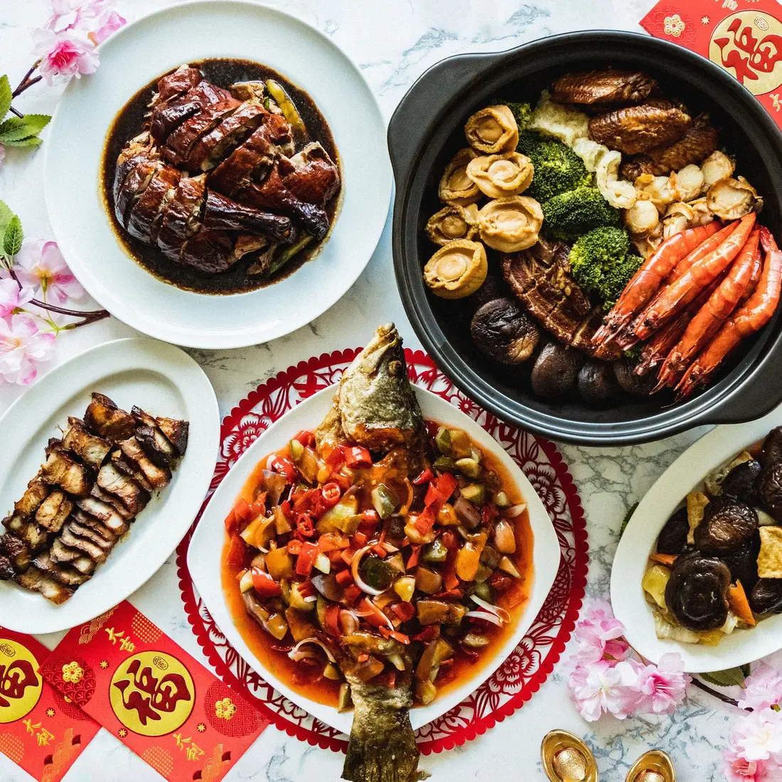 Chinese New Year buffet catering line with chafing dishes set up in Singapore