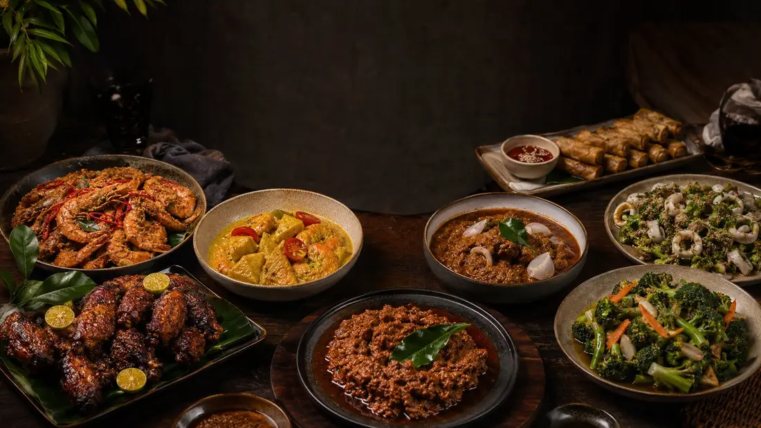 Lunch catering spread of local dishes delivered to a Singapore office