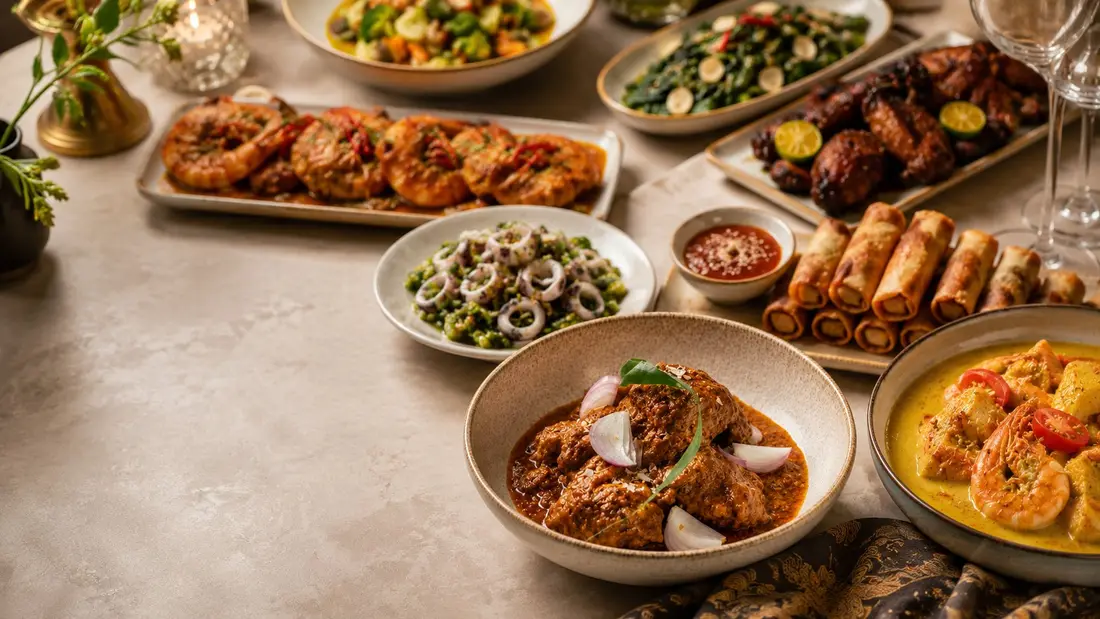 Simple catering spread of local dishes delivered for a wake in Singapore