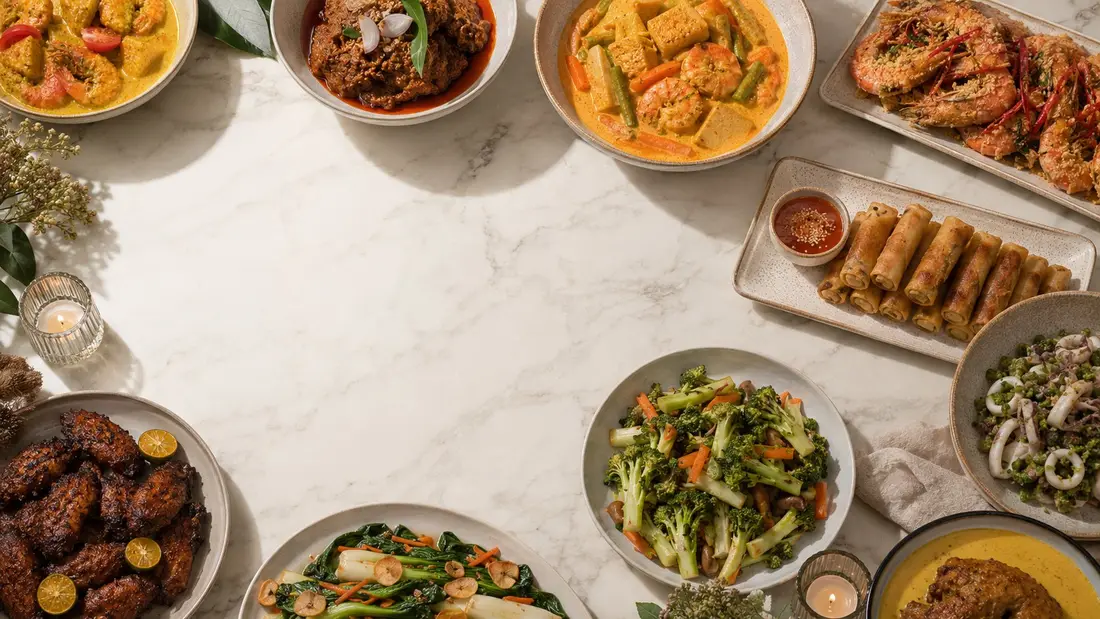 Overhead view of a mini buffet catering spread of local dishes for 30 people in Singapore