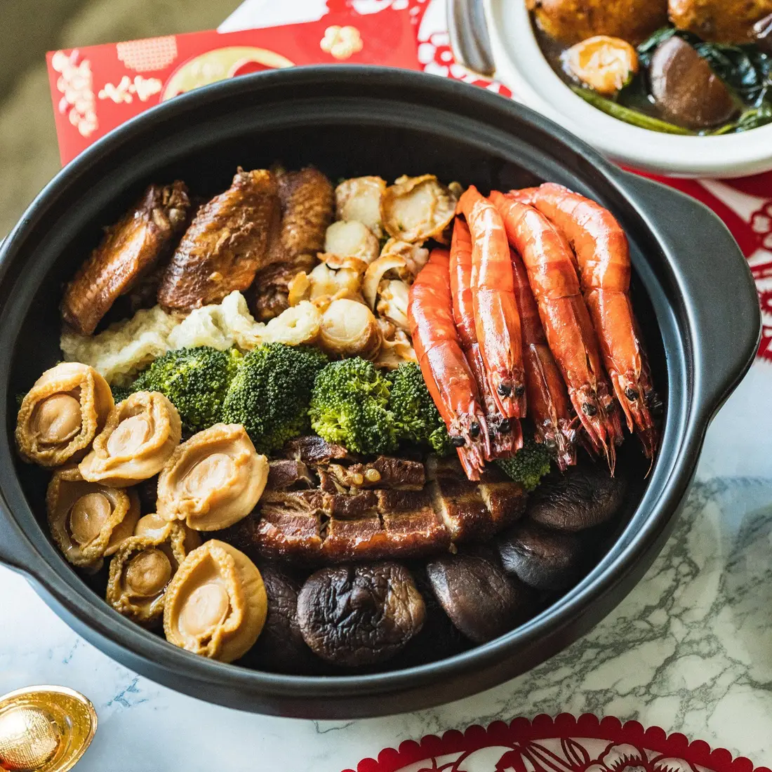 Pen cai served as the centrepiece of a Chinese New Year catering spread in Singapore